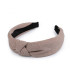 Elegantes Haarband mit einfarbigem Stoff und Streifenstruktur mit Knoten